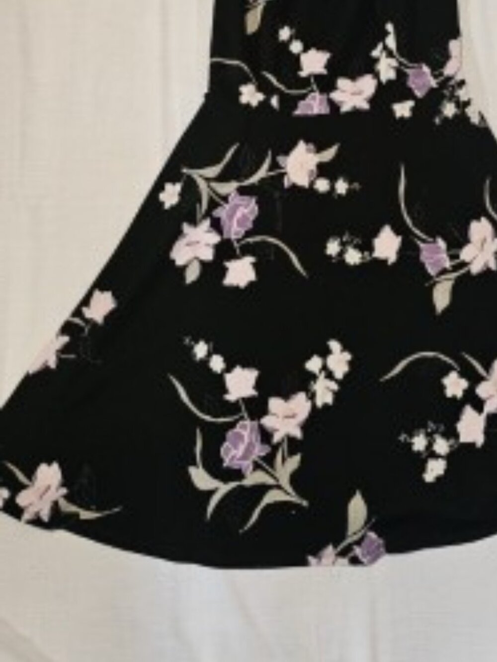 Beautiful black dress with soft pink, purple, and white floral print.